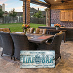 Tiki bar sign shown in patio setting